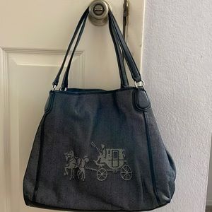 Blue Coach Bag. Silver grommets and blue leather. Classic Coach horse and rider.
